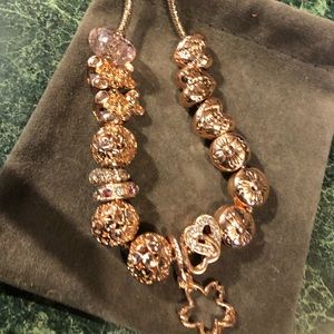 Set of 16 gold tone charms without chain